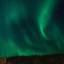 Magnífica Aurora Boreal em Dawson City, no Yukon Territory, noroeste do Canadá